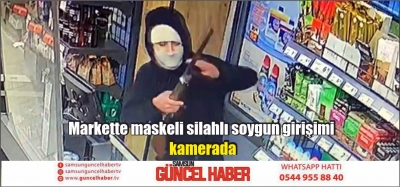 Markette maskeli silahlı soygun girişimi kamerada