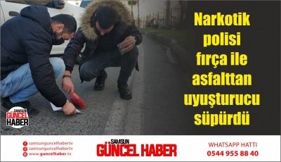 Narkotik polisi fırça ile asfalttan uyuşturucu süpürdü