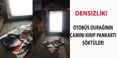 OTOBÜS DURAĞININ CAMINI KIRIP PANKARTI SÖKTÜLER